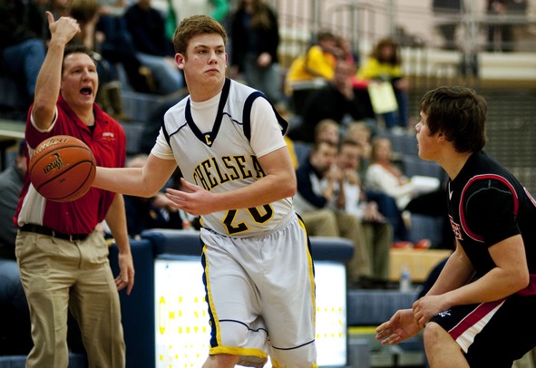 Chelsea High School senior Logan Brown looks to pass in the game against Pinckney during the Chelsea High Basketball Tournament on Friday, Dec. 28. Daniel Brenner I AnnArbor.com